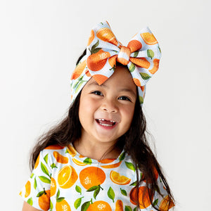 Baby Kids Bamboo Pajamas — Orange You Sweet Biggie Bow — Image 1