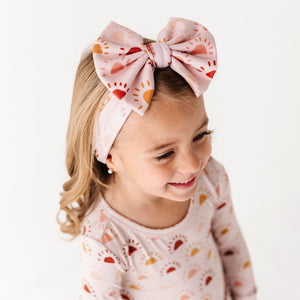 Baby Kids Bamboo Pajamas — Rise Above Biggie Bow — Image 1