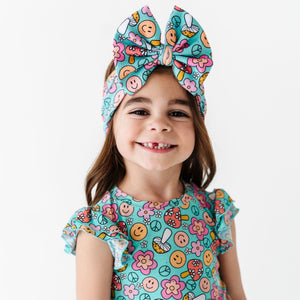 Baby Kids Bamboo Pajamas — Don't Worry Be Hippie Biggie Bow — Image 1