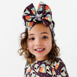 Baby Kids Bamboo Pajamas — Cosmic in Peace Biggie Bow — Image 1