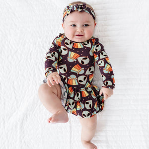 Baby Kids Bamboo Pajamas — Cosmic in Peace Ruffle Dress — Image 1