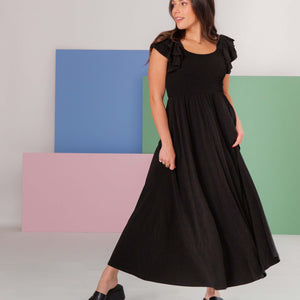 Baby Kids Bamboo Pajamas — Black Women's Cap Sleeve Dress — Image 1
