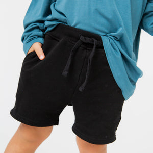 Baby Kids Bamboo Pajamas — Black Pull-On Shorts — Image 1
