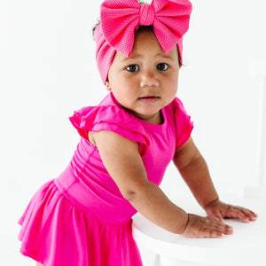 Baby Kids Bamboo Pajamas — Flamingo Pink Cap Sleeve Ruffle Dress — Image 1
