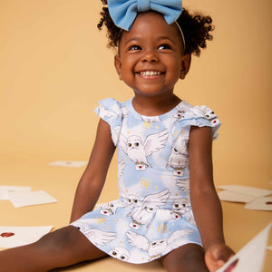 Baby Kids Bamboo Pajamas — Harry Potter™ Hedwig's Sky Mail Cap Sleeve Ruffle Dress — Image 1