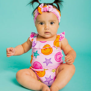 Baby Kids Bamboo Pajamas — Peachy Power Bubble Romper — Image 1