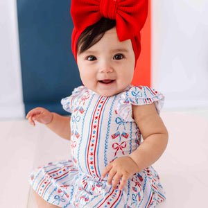 Baby Kids Bamboo Pajamas ā Liberty & Bows for All Cap Sleeve Ruffle Dress ā Image 1