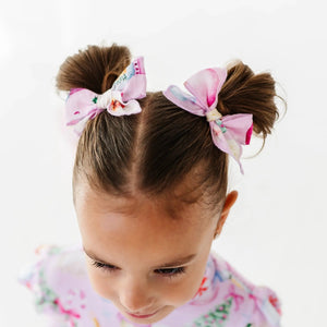 Baby Kids Bamboo Pajamas — Merry Little Pinkmas Woven Piggy Clip — Image 1