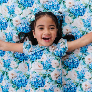 Baby Kids Bamboo Pajamas — Once in a Blue Bloom Ruffle Bum Bum Blanket — Image 1