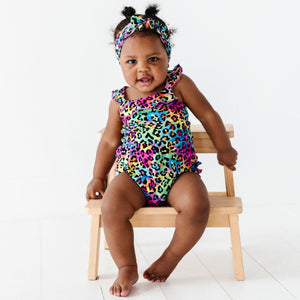 Baby Kids Bamboo Pajamas — Roarin' Rainbow Bubble Romper — Image 1