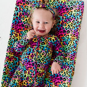 Baby Kids Bamboo Pajamas — Roarin' Rainbow Changing Pad Cover — Image 1
