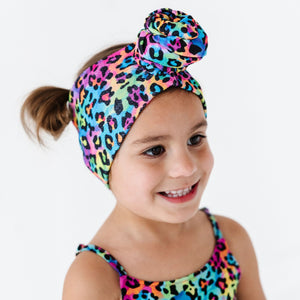 Baby Kids Bamboo Pajamas — Roarin' Rainbow Top Knot — Image 1