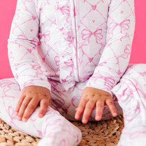 Baby Kids Bamboo Pajamas — Take A Bow Ruffle Footie — Image 1
