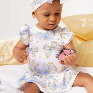 Baby Kids Bamboo Pajamas — Wish Upon A Wing Cap Sleeve Ruffle Dress — Image 1