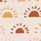 Pattern of sun-like shapes in warm colors.