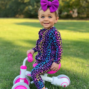 Baby Kids Bamboo Pajamas — Livin' La Cheetah Loca Ruffle Romper — Image 1