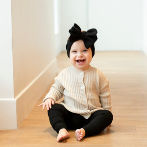 Baby Kids Bamboo Pajamas — Oat Ribbed Knit Button Sweater — Image 1