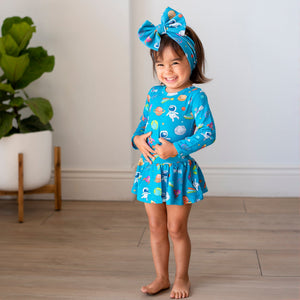Baby Kids Bamboo Pajamas — Once in a Blue Moon Ruffle Dress — Image 1