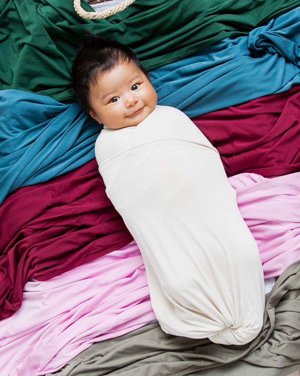 Blank black placeholder image accompanying a question about bamboo baby pajamas' machine-drying and pilling.