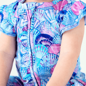 Baby Kids Bamboo Pajamas — Cute as Shell Ruffle Romper — Image 1