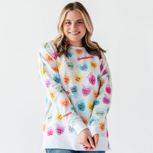Sweethearts® Colorful Candy Hearts Women's Crew Neck Sweatshirt - Image 1 - Bums & Roses