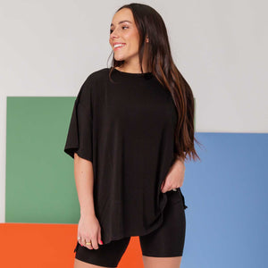 Baby Kids Bamboo Pajamas — Black Women's Oversized T-Shirt and Biker Shorts Set — Image 1