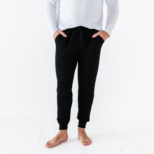 Baby Kids Bamboo Pajamas — Black Men's Jogger Sweatpants — Image 1