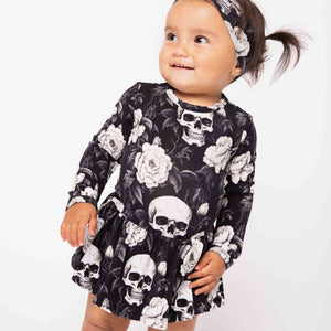 Baby Kids Bamboo Pajamas — Bones and Roses Long Sleeve Ruffle Dress — Image 1