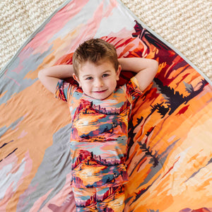 Baby Kids Bamboo Pajamas — Saddle Up Sunset Bum Bum Blanket — Image 1