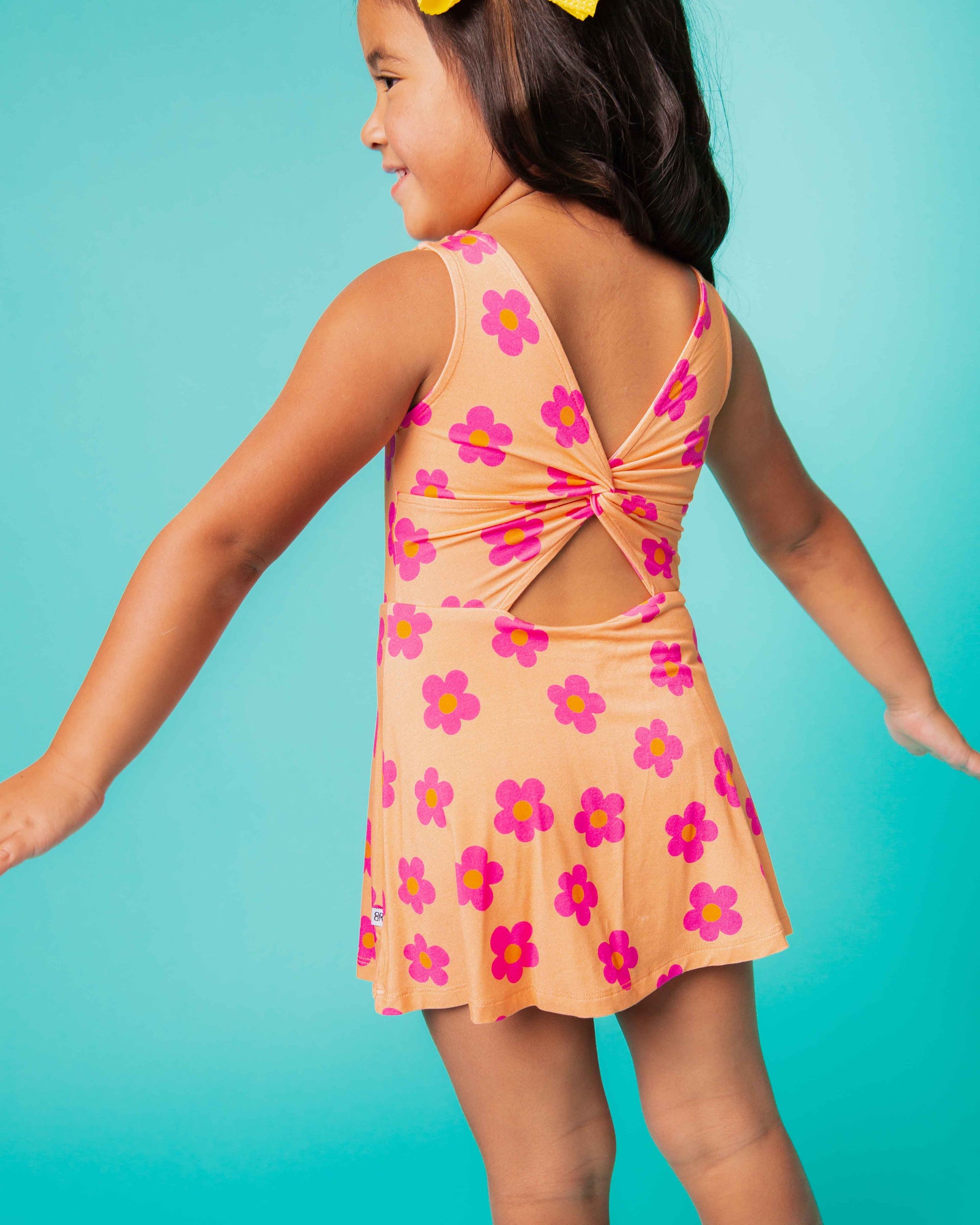 Baby Kids Bamboo Pajamas — Flower Child Sleeveless Twistback Dress — Image 1