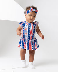 Baby Kids Bamboo Pajamas — Liberty Belle Cap Sleeve Ruffle Dress — Image 1