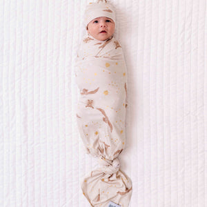 Bums & Roses - Baby & Kids Bamboo Pajamas - Harry Potter™ Hedwig’s Flight Swaddle + Beanie Kit - Image 1