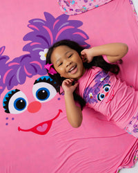 Baby Kids Bamboo Pajamas — Sesame Street™ Abby Cadabby Bum Bum Blanket — Image 1