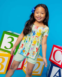 Baby Kids Bamboo Pajamas — Sesame Street™ Playtime Pals Short Sleeve Empire Waist Top & Shorts Set — Image 1