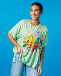 Baby Kids Bamboo Pajamas — Sesame Street™ Playtime Pals Women's Oversized T-Shirt — Image 1