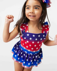 Baby Kids Bamboo Pajamas — Stars Aligned Peplum One Piece Swimsuit — Image 1