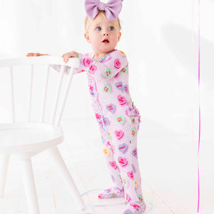 Bums & Roses - Baby & Kids Bamboo Pajamas - Sweethearts® Pink Stripe Convertible Ruffle Romper - Image 1