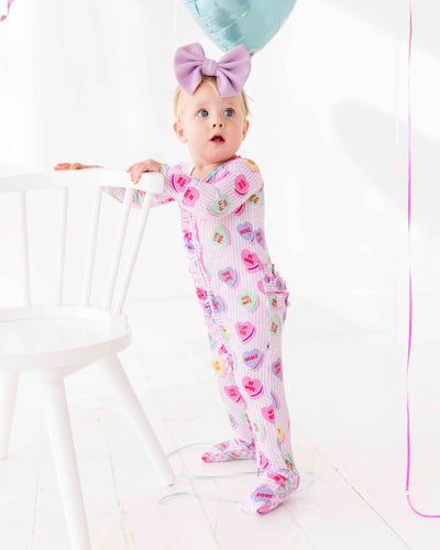 Bums & Roses - Baby & Kids Bamboo Pajamas - Sweethearts® Pink Stripe Convertible Ruffle Romper - Image 1