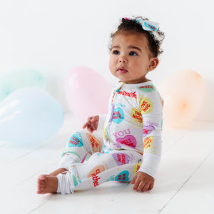 Sweethearts® Colorful Candy Hearts Convertible Romper - Image 1 - Bums & Roses