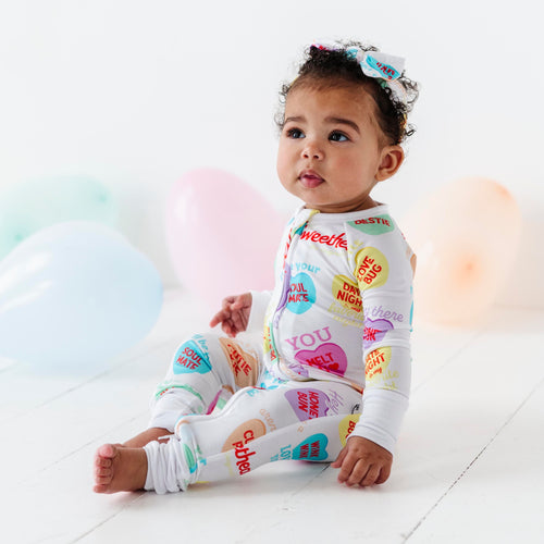 Sweethearts® Colorful Candy Hearts Convertible Romper - Image 1 - Bums & Roses