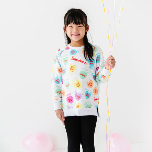 Sweethearts® Colorful Candy Hearts Crew Neck Sweatshirt - Image 1 - Bums & Roses