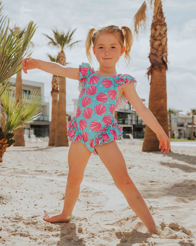 Baby Kids Bamboo Pajamas — Talk to the Shell Peplum One Piece Swimsuit — Image 1