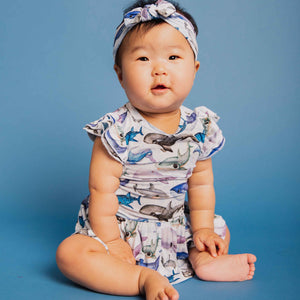 Baby Kids Bamboo Pajamas — Whalecome to the Party Cap Sleeve Ruffle Dress — Image 1
