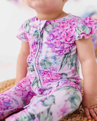 Baby Kids Bamboo Pajamas — You Had Me At Hydrangea Ruffle Zipper Romper - Cap Sleeves — Image 1