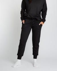 Baby Kids Bamboo Pajamas — Black Women's Jogger Sweatpants — Image 1