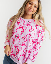 Baby Kids Bamboo Pajamas — Candy Cane Crush Women's Relaxed Crew Neck Sweatshirt — Image 1