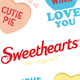 Sweethearts® candy hearts with phrases: 'Cutie Pie', 'Love You', 'Be Mine'.