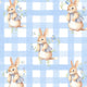 Pattern of rabbits on a blue checkered background.