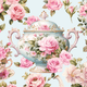 Floral teapot with pink roses on light blue background