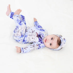 Bums & Roses - Baby & Kids Bamboo Pajamas - Worth Every Peony Ruffle Romper - Image 1